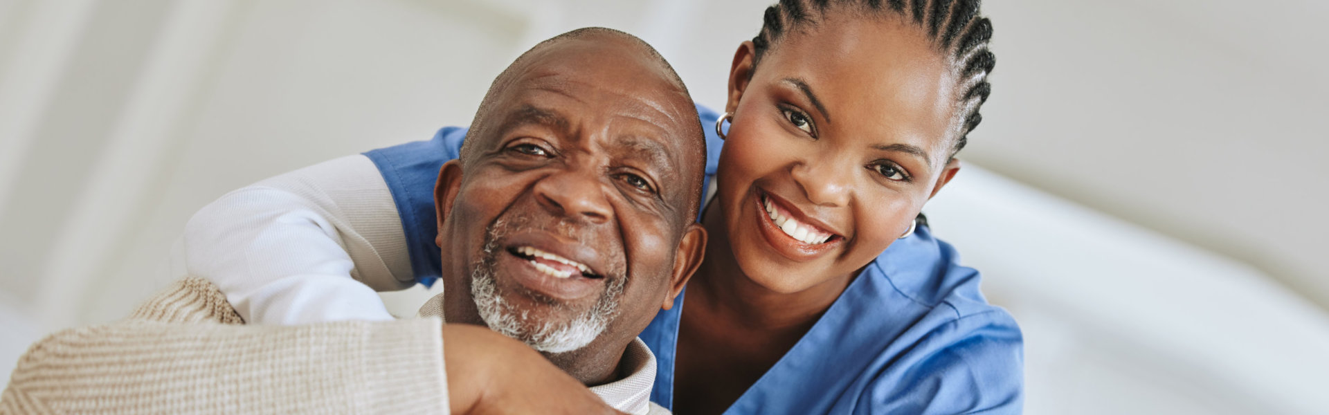caregiver hugged her patient